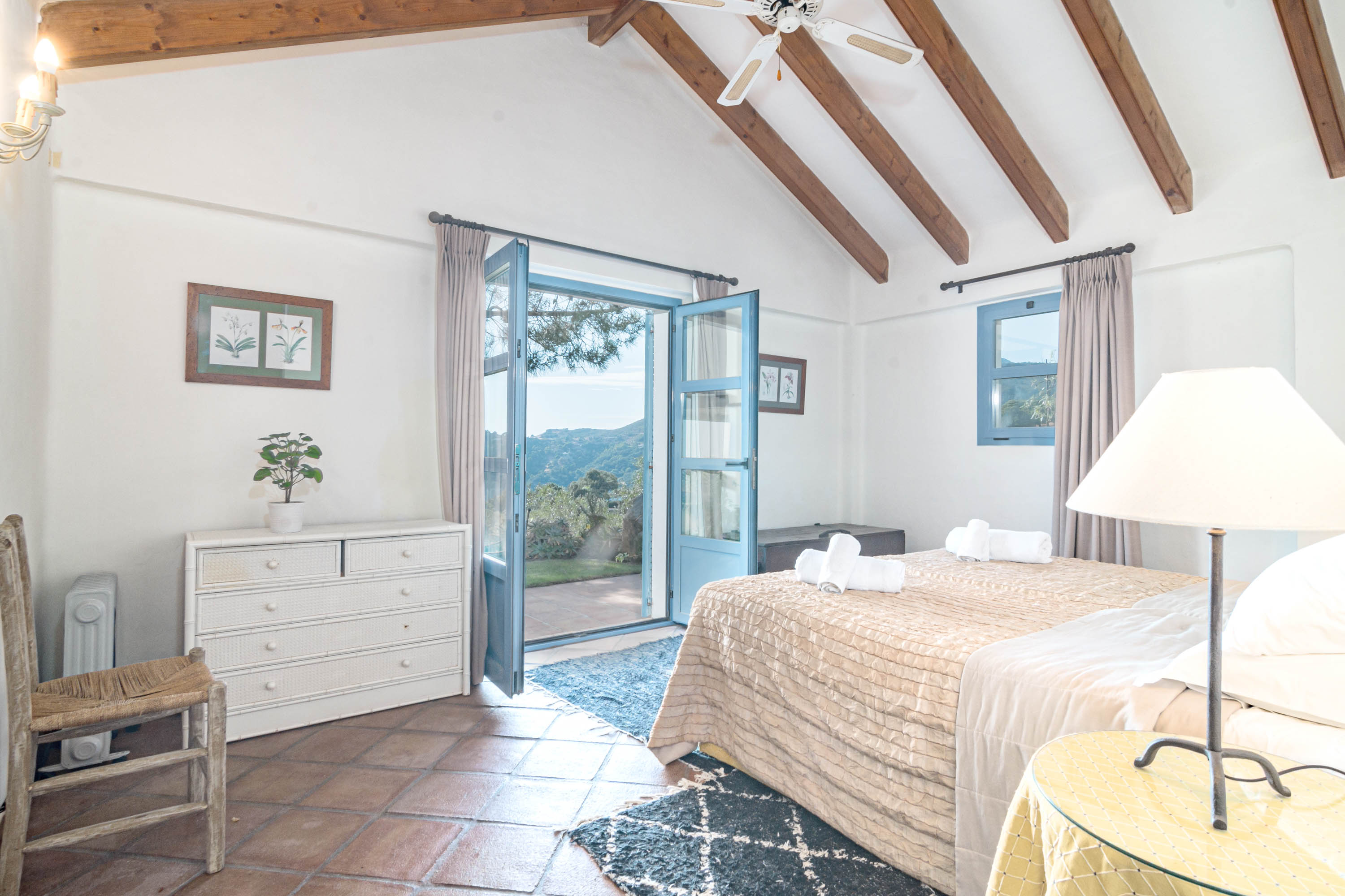 All bedroom with doors to gardens